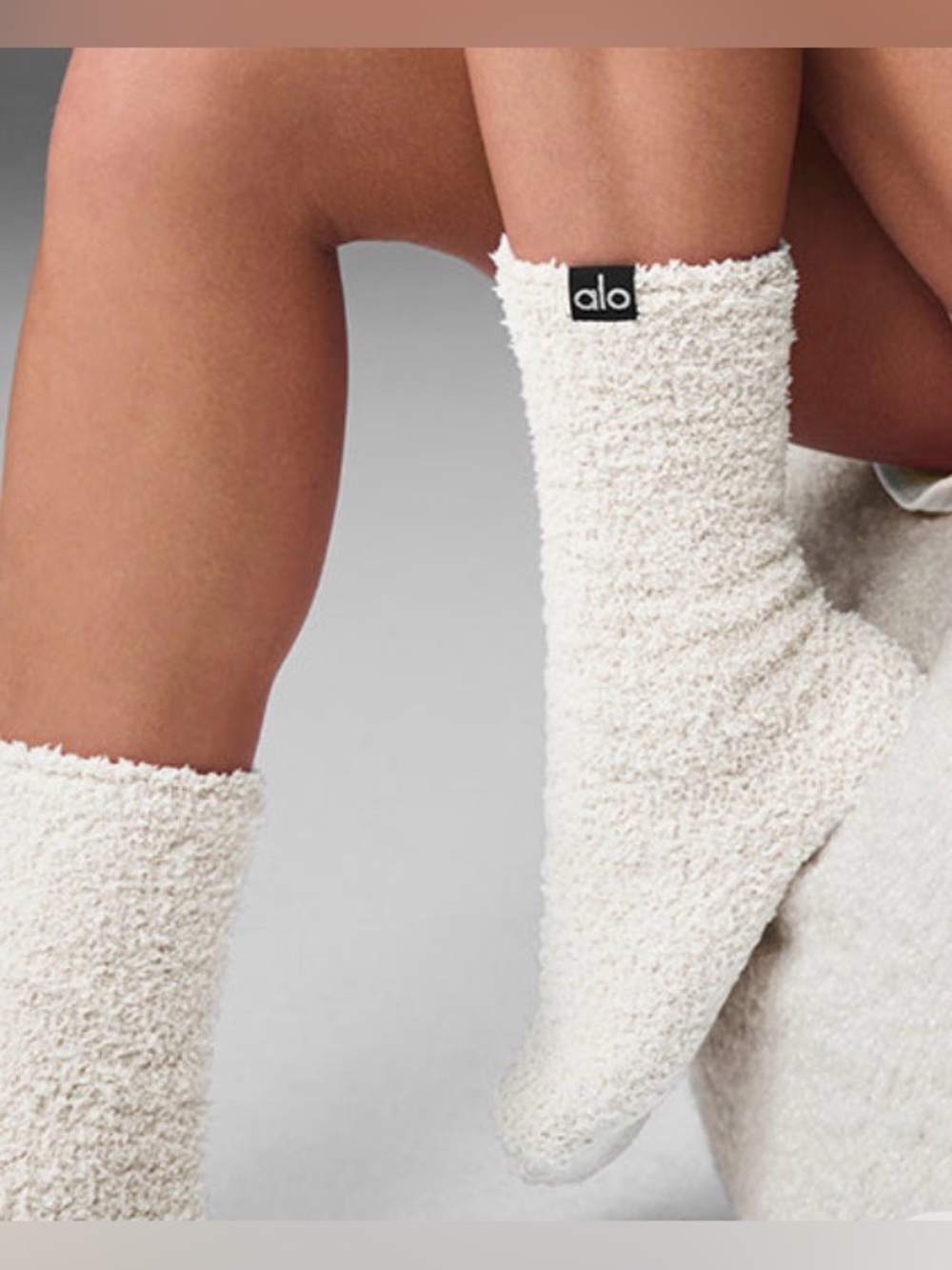 ALO Yoga Women’s Plush Lush Socks in Ivory.